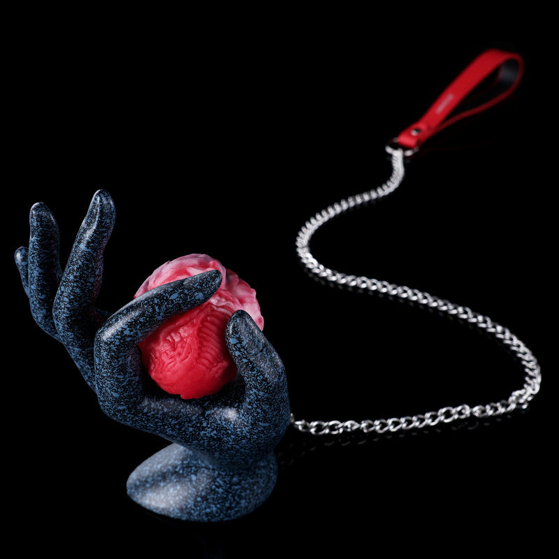 Plug anal et vaginal œuf monstrueux infernal en silicone avec chaîne-laisse robuste (tailles M/L)