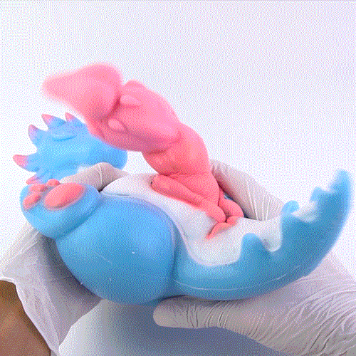 Jouet sexuel Pocket Dragon — Silicone platine, Bête fantastique bleue, Manche rose texturé et Canal de stimulation interne