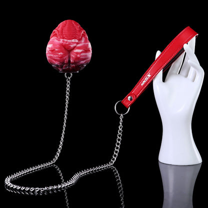 Plug anal et vaginal œuf monstrueux infernal en silicone avec chaîne-laisse robuste (tailles M/L)