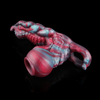Rallonge pénienne en silicone platine 2-en-1 avec nœud de fantaisie et stimulateur clitoridien pour les couples qui en veulent plus
